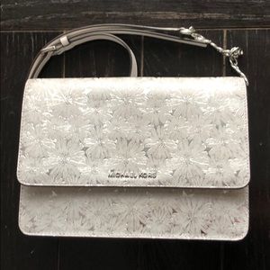 Michael Kors flower crossbody purse gently used